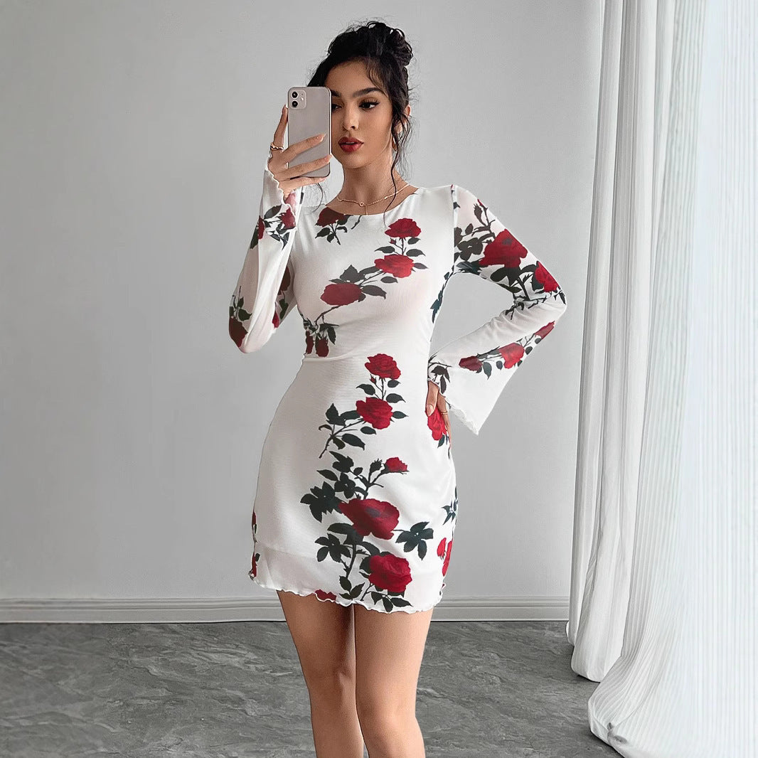 Robe Nymia Mini Robe Fleurie Transparente à Manches Évasées et Dos Nu