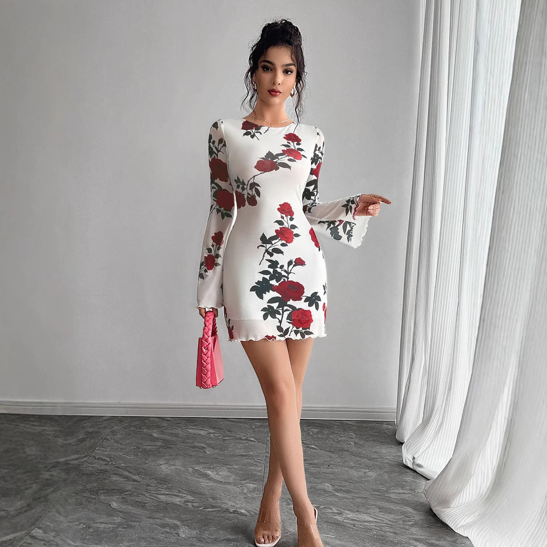 Robe Nymia Mini Robe Fleurie Transparente à Manches Évasées et Dos Nu