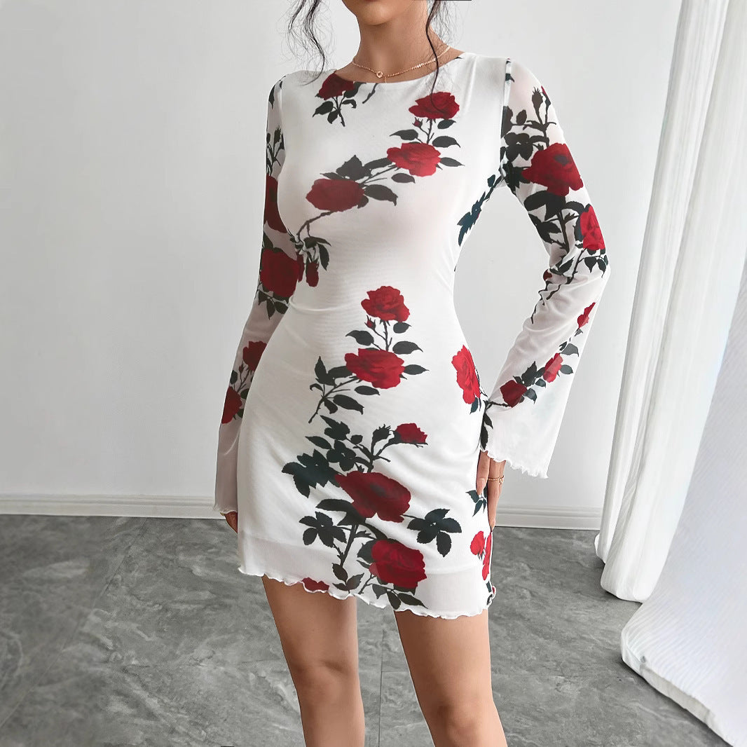 Robe Nymia Mini Robe Fleurie Transparente à Manches Évasées et Dos Nu