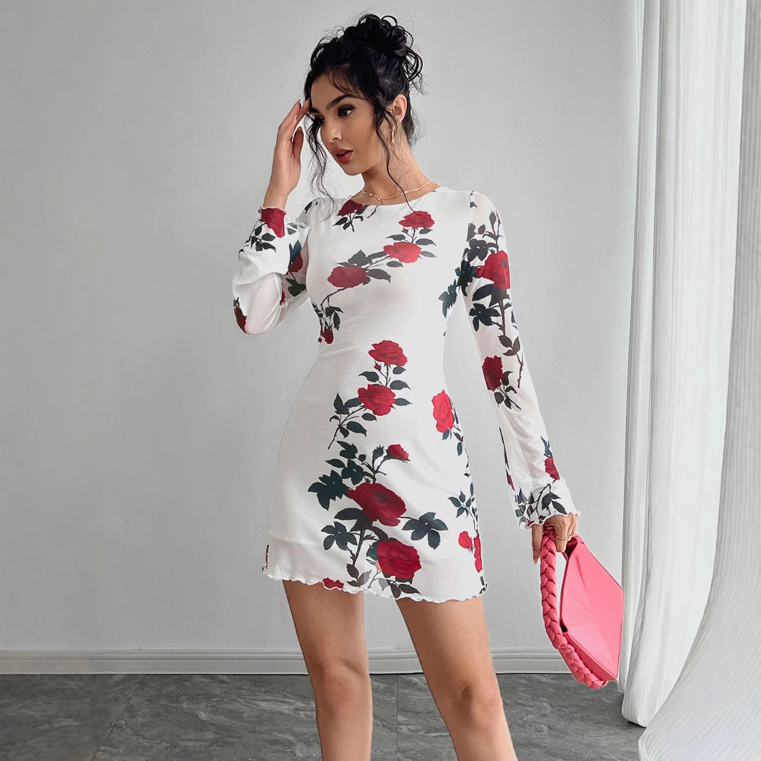 Robe Nymia Mini Robe Fleurie Transparente à Manches Évasées et Dos Nu